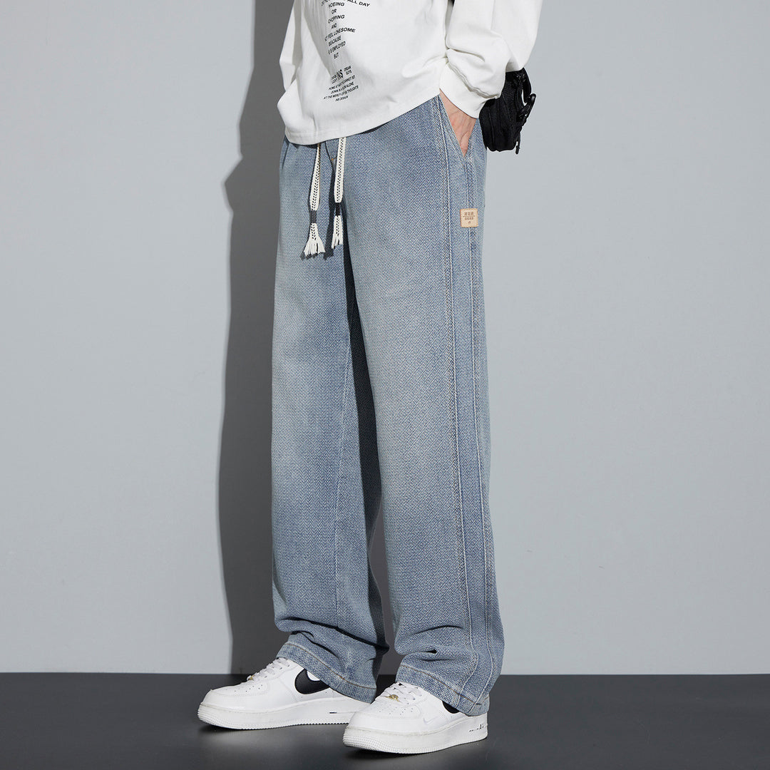 Herren Weite Denim-Jogginghose mit geflochtenem Kordelzug und Fischgrätstruktur Nord Taschen