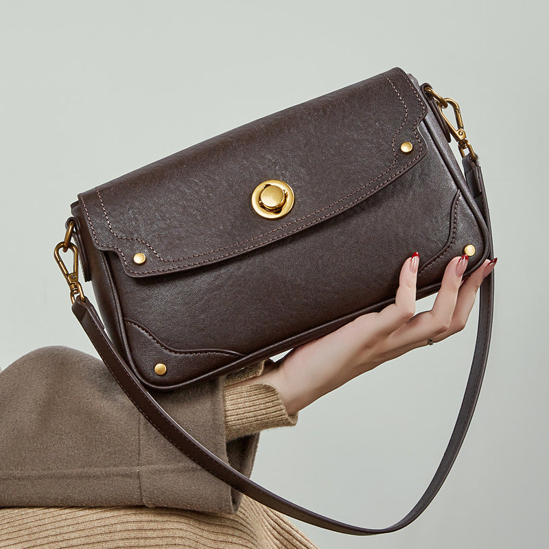 Damen Umhängetasche aus hochwertigem Kunstleder mit eleganter Klappenöffnung Nord Taschen
