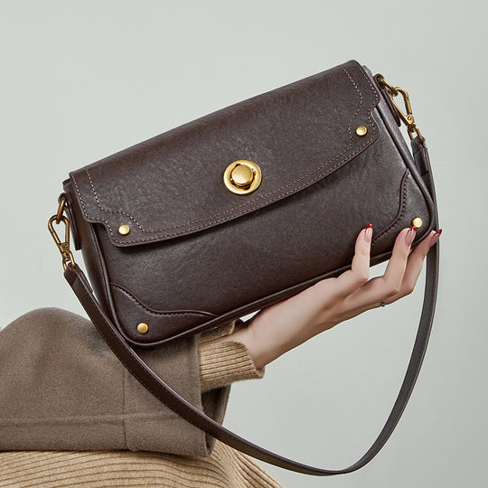 Damen Umhängetasche aus hochwertigem Kunstleder mit eleganter Klappenöffnung Nord Taschen