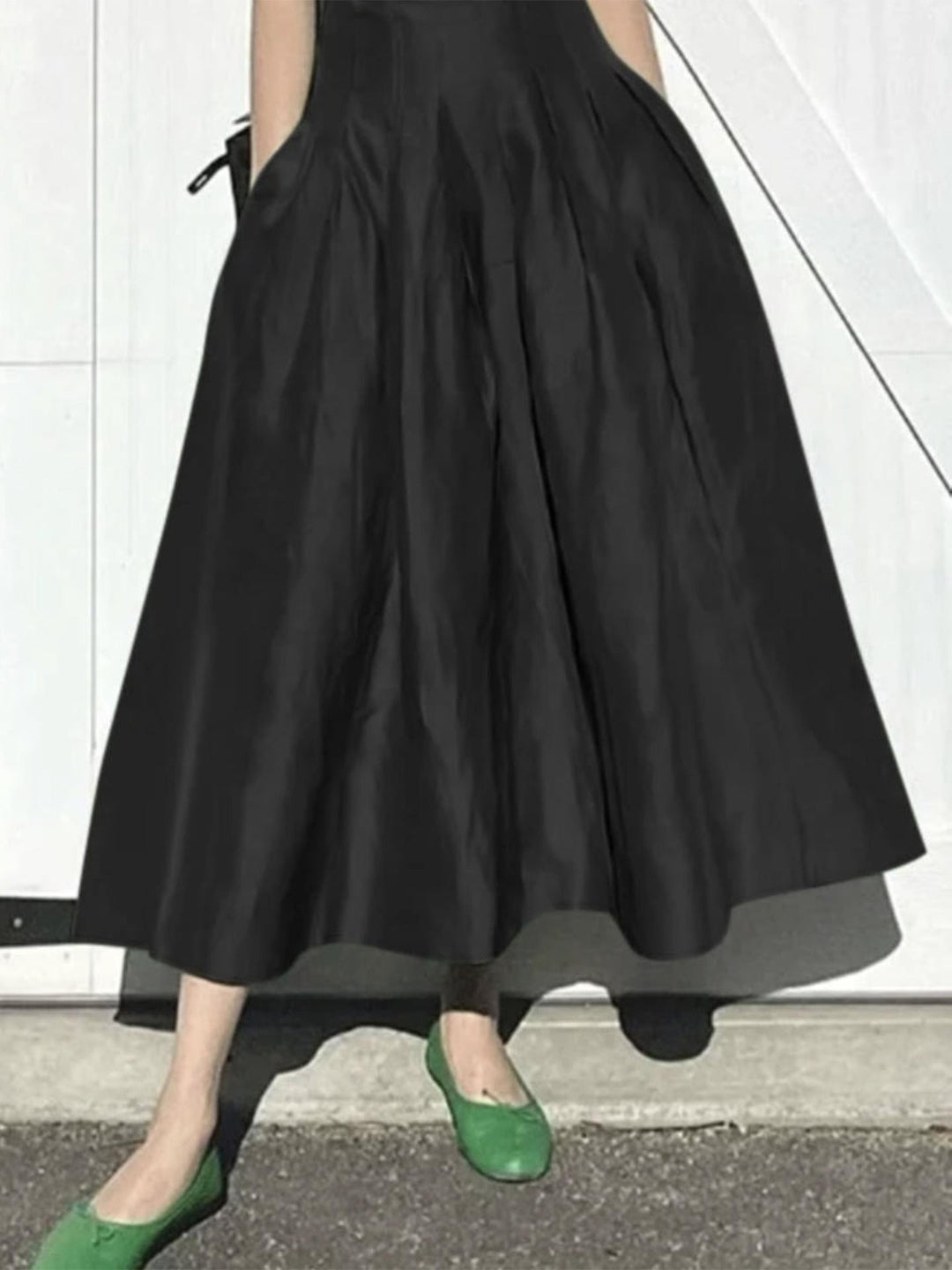 Damen Eleganter Midirock mit fließendem Schnitt und seitlichen Taschen