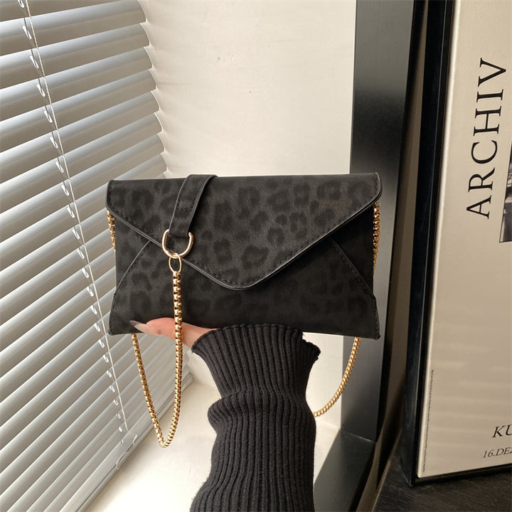 Damen elegante Clutch mit Kettenakzent Nord Taschen