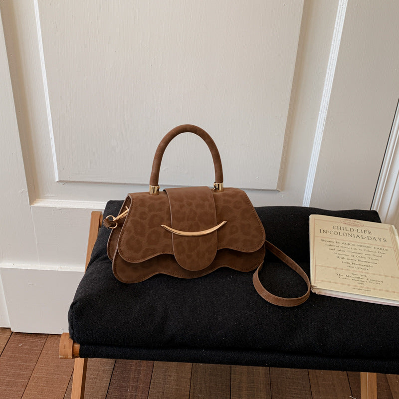 Damen strukturierte Handtasche mit eleganter Klappöffnung Nord Taschen