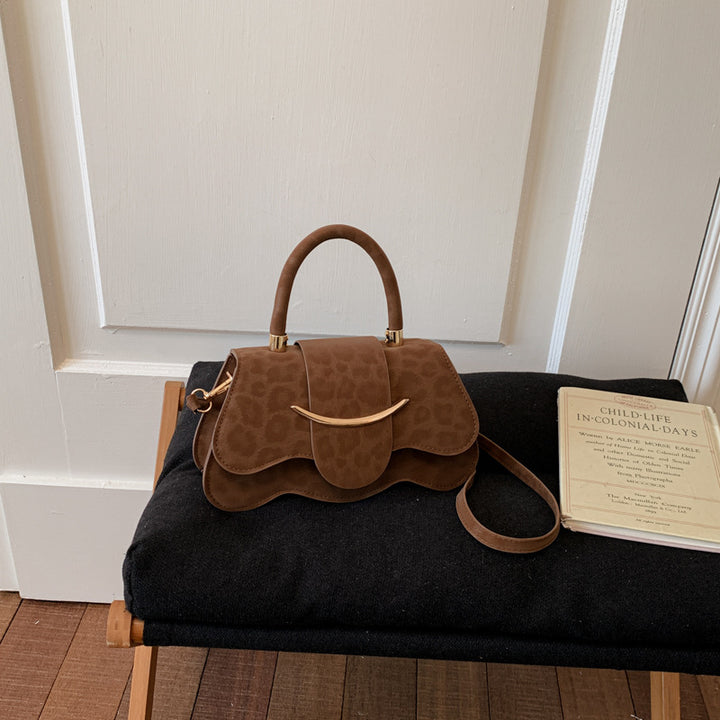 Damen strukturierte Handtasche mit eleganter Klappöffnung Nord Taschen