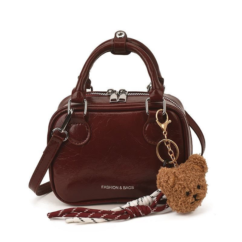 Damen Mini-Handtasche mit niedlichem Anhänger Nord Taschen