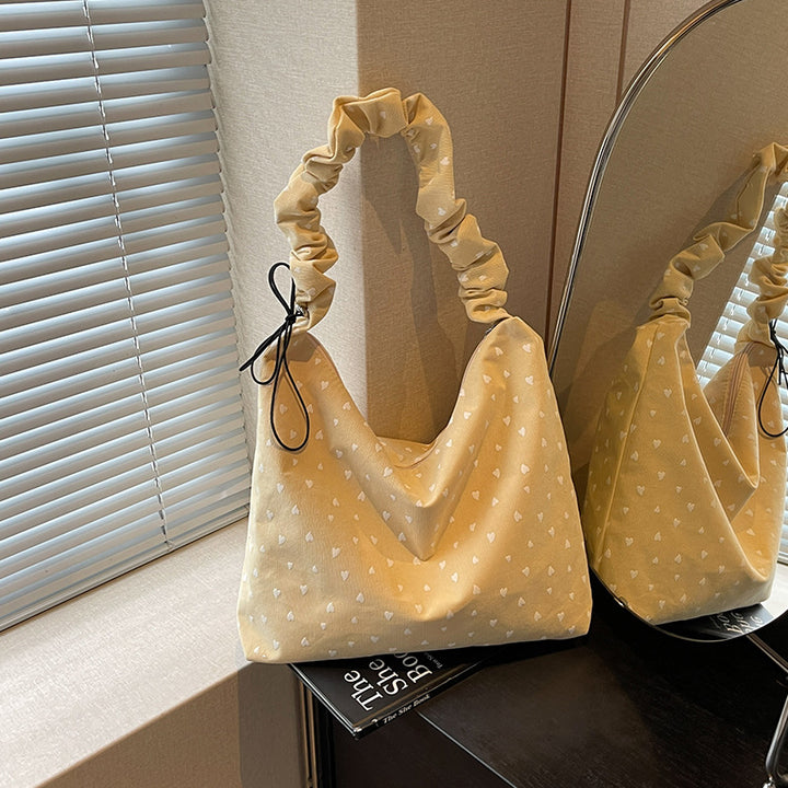 Damen Hobo-Tasche mit verspieltem Herzdesign und elastischen Trageriemen Nord Taschen