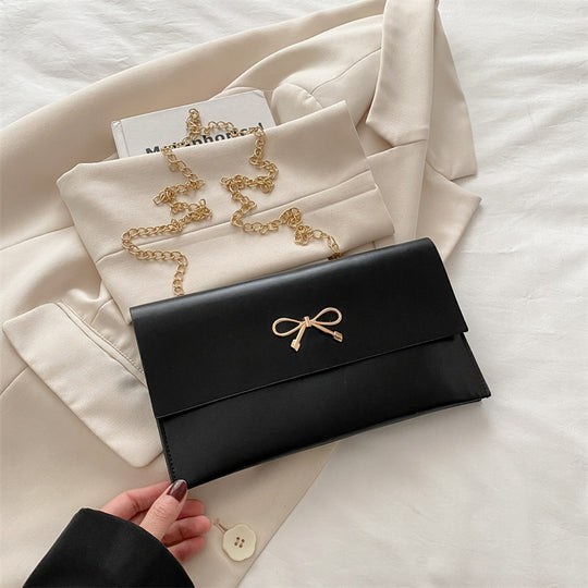 Damen elegante Clutch im minimalistischen Design mit goldenen Akzenten Nord Taschen