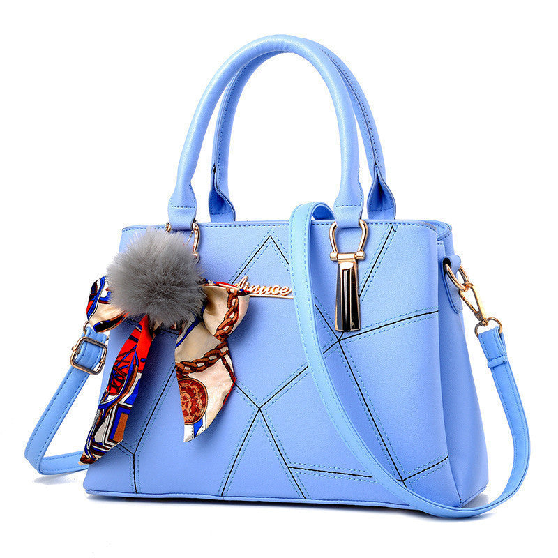 Damen Handtasche mit elegantem geometrischem Design und verspieltem Schal Nord Taschen