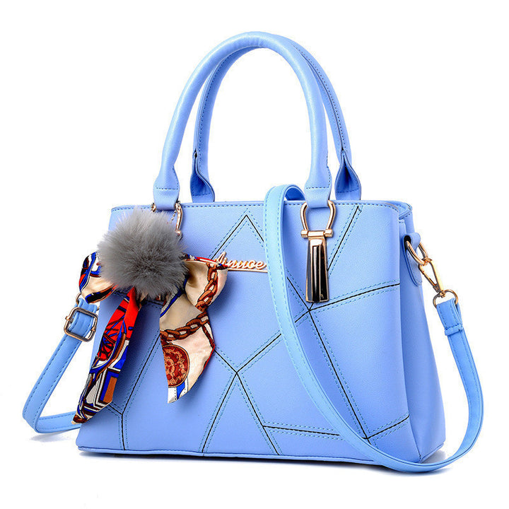 Damen Handtasche mit elegantem geometrischem Design und verspieltem Schal Nord Taschen