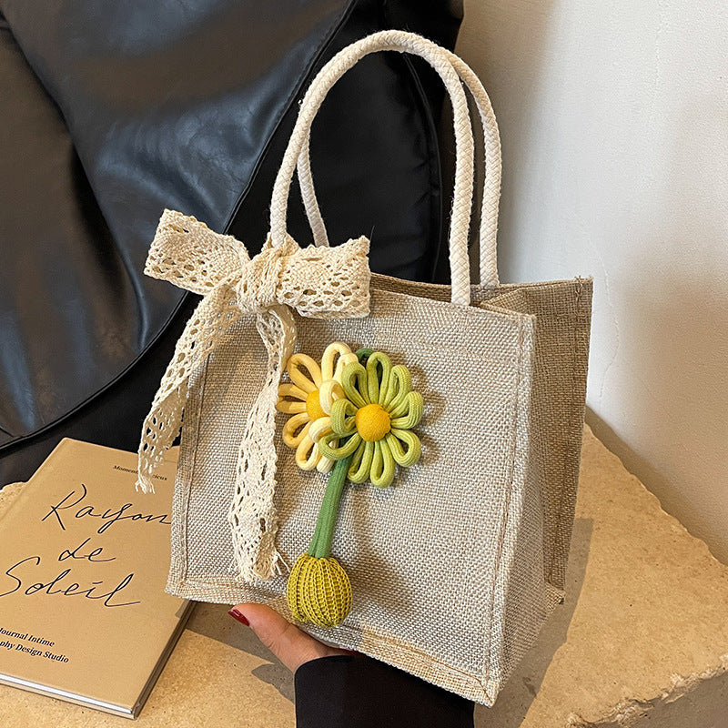 Damen Jute-Tasche mit dekorativer Blumenapplikation und verspieltem Schleifenverschluss Nord Taschen