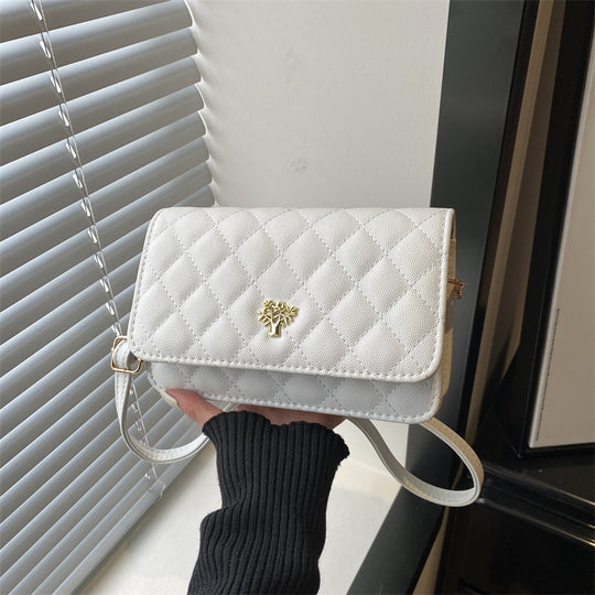 Damen Umhängetasche mit eleganter Steppung und goldenen Akzenten Nord Taschen