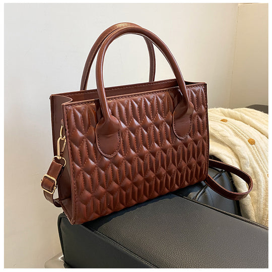 Damen elegante Handtasche mit quilted Design Nord Taschen