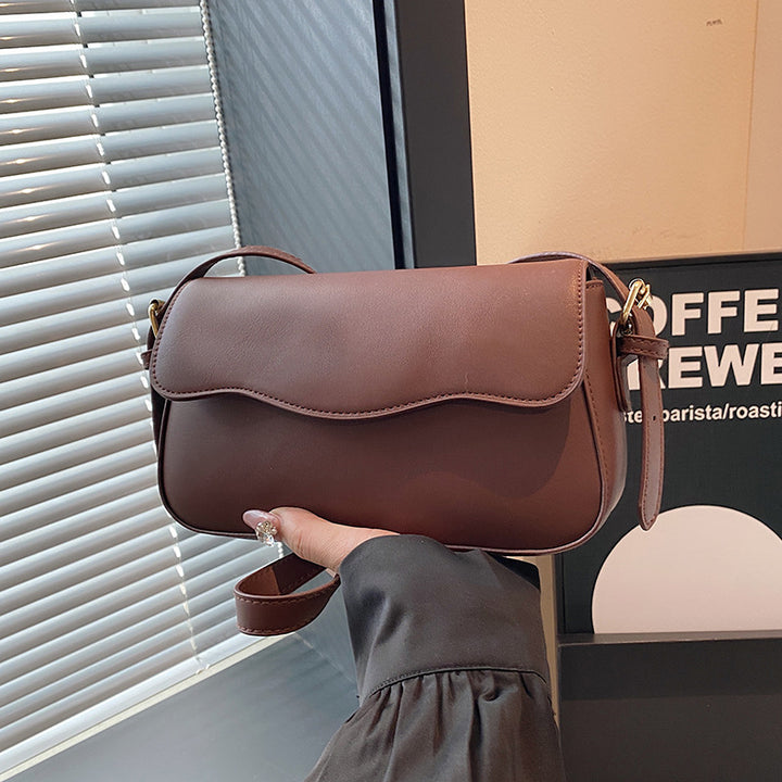 Damen Umhängetasche mit elegantem Wellenmuster Nord Taschen