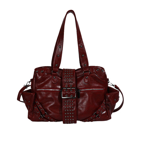 Damen Schultertasche im angesagten Rock-Stil mit dekorativen Nieten Nord Taschen