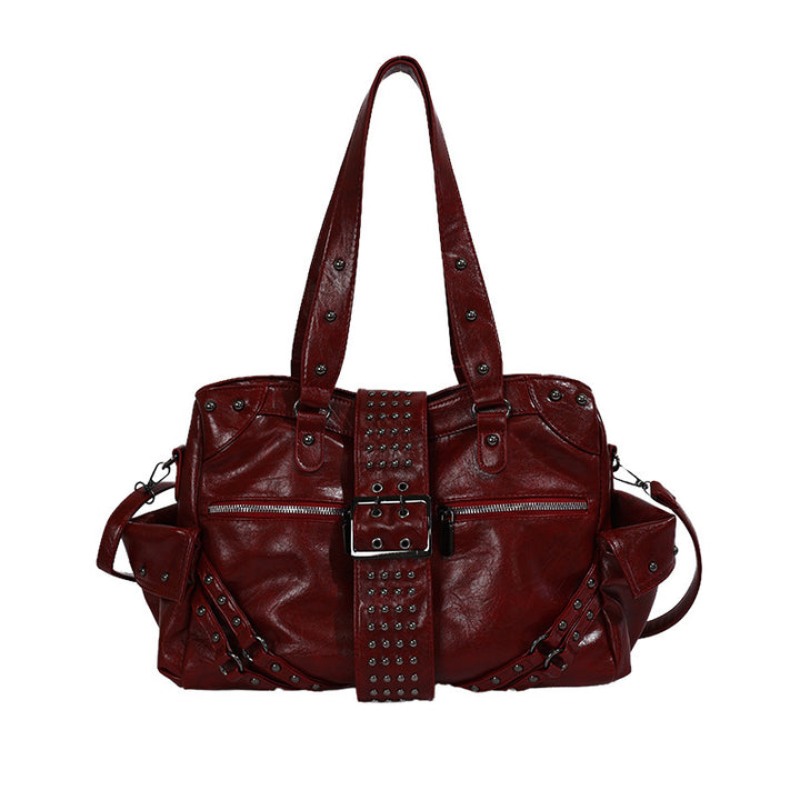 Damen Schultertasche im angesagten Rock-Stil mit dekorativen Nieten Nord Taschen