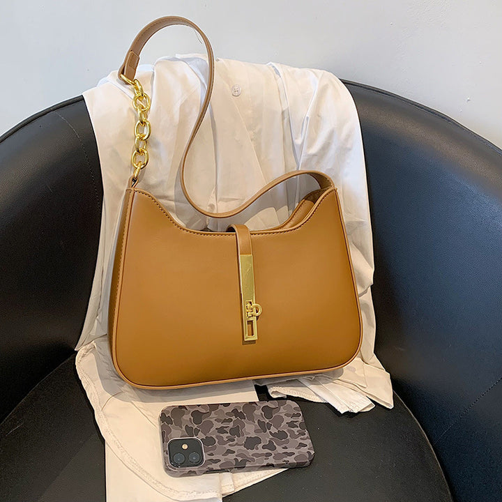 Damen Schultertasche mit elegantem Kettenverschluss und modernem Design Nord Taschen
