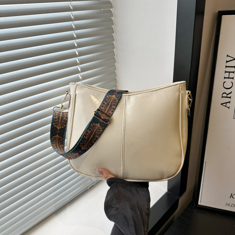 Damen elegante Umhängetasche mit kunstvollem Tragegurt Nord Taschen