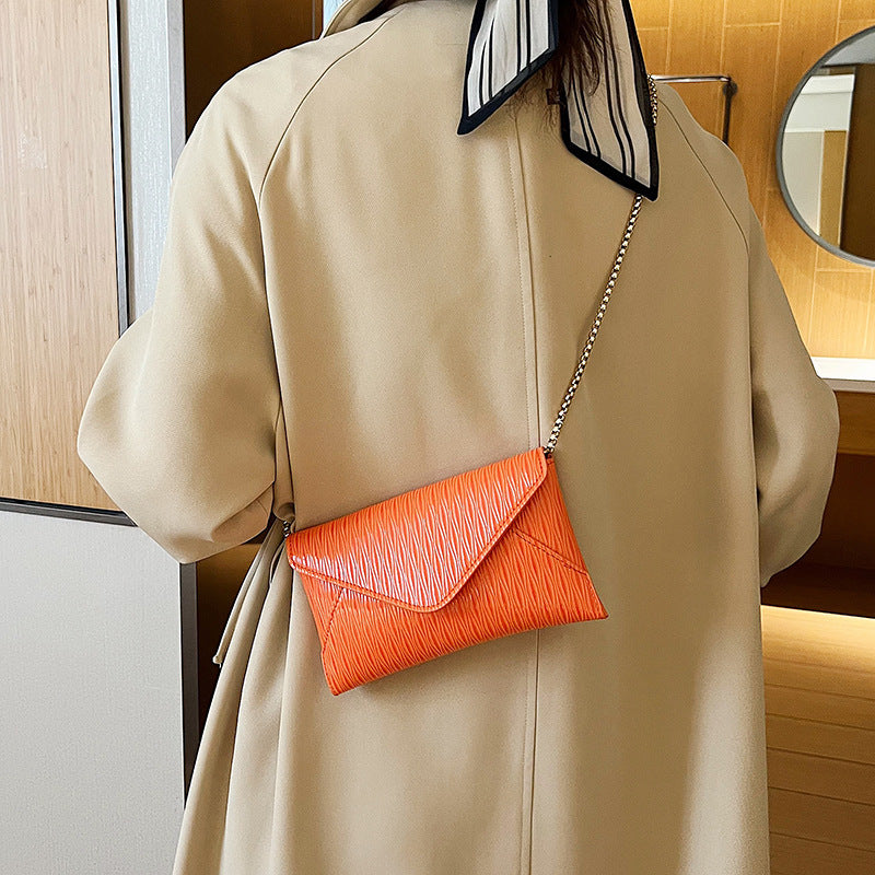 Damen elegante Clutch mit glänzendem Obermaterial Nord Taschen