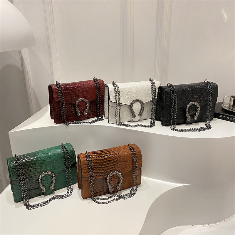 Damen elegante Handtasche mit stilvollem Schlangenverschluss Nord Taschen