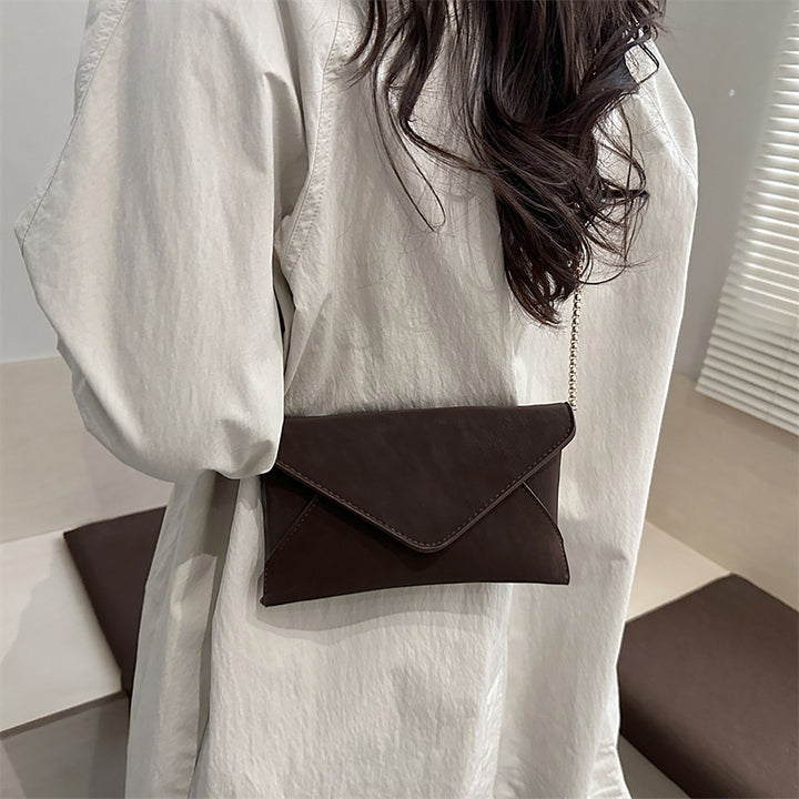 Damen Clutch-Tasche mit elegantem Umschlagdesign und feinem Kunstleder Nord Taschen