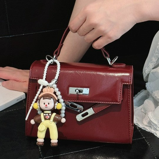 Damen Mini Handtasche mit süßem Anhänger Nord Taschen