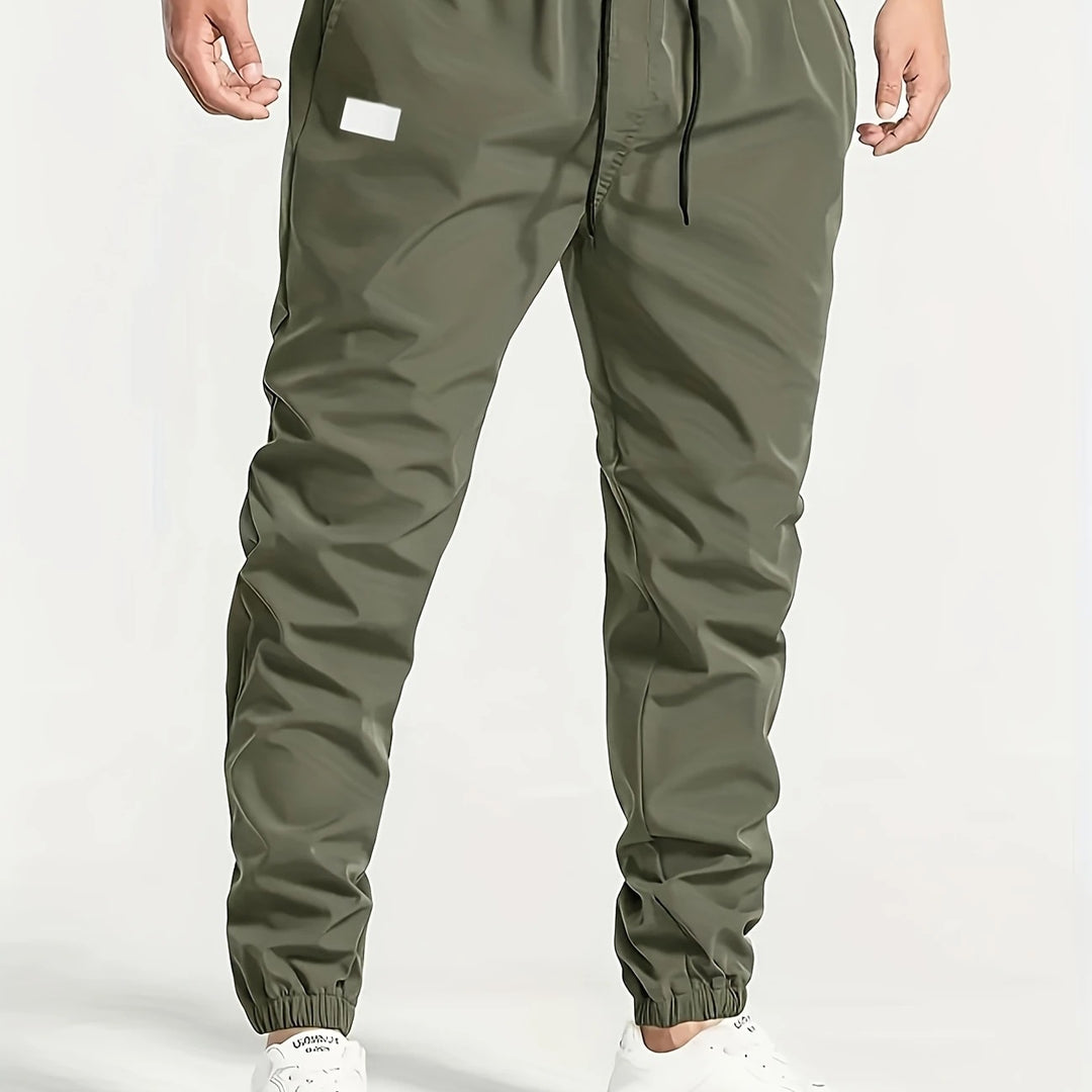 Herren Slim‑Tapered Tech‑Joggerhose mit Tunnelzugbund, elastischen Knöchelbündchen und funktionalen Seitentaschen Nord Taschen