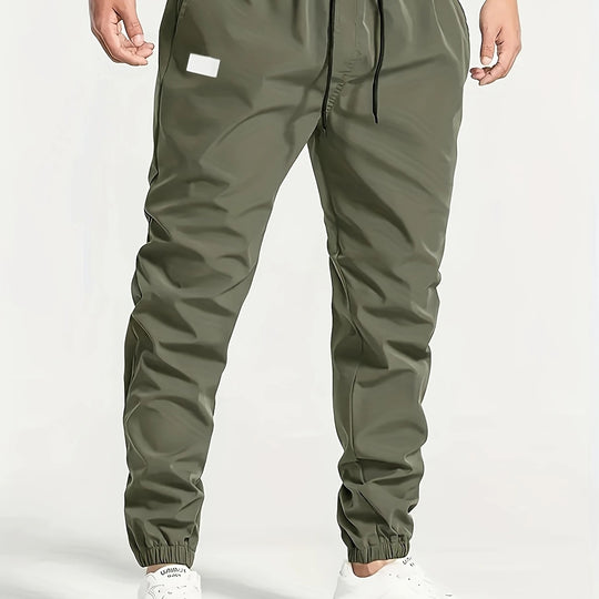 Herren Slim‑Tapered Tech‑Joggerhose mit Tunnelzugbund, elastischen Knöchelbündchen und funktionalen Seitentaschen Nord Taschen