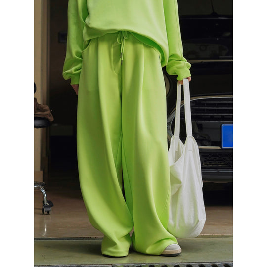 Damen Weite High‑Waist Sweatpalazzohose mit Tunnelzug, aufgesetzten Eingrifftaschen und fließender Oversize‑Silhouette Nord Taschen