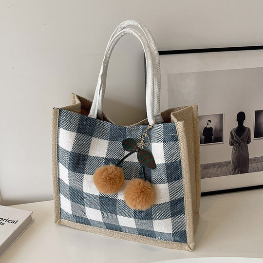 Damen Shopper-Tasche mit kariertem Design und verspielten Pompons Nord Taschen