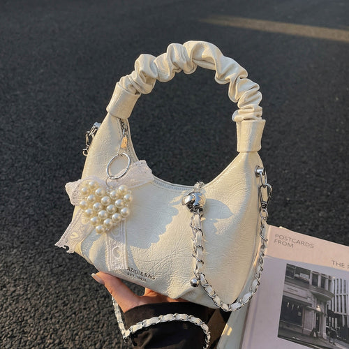 Damen Mini-Handtasche mit voluminösem Rüschendesign und trendy Anhängern Nord Taschen
