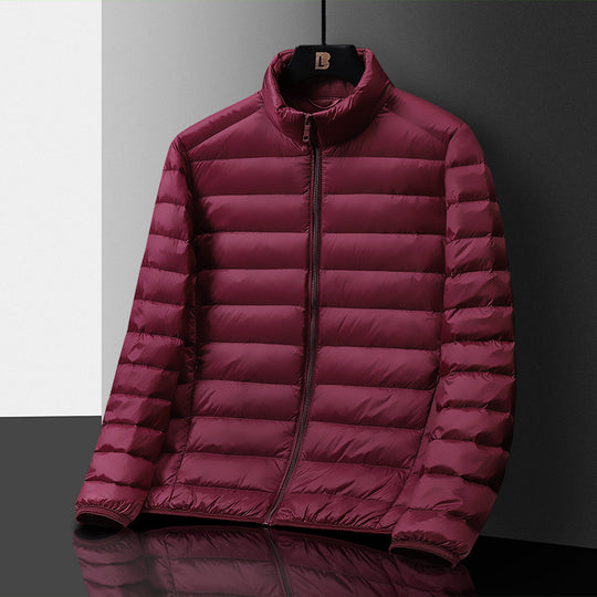 Herren Ultraleichte gesteppte Daunenimitat‑Steppjacke mit Stehkragen und Packfunktion Nord Taschen