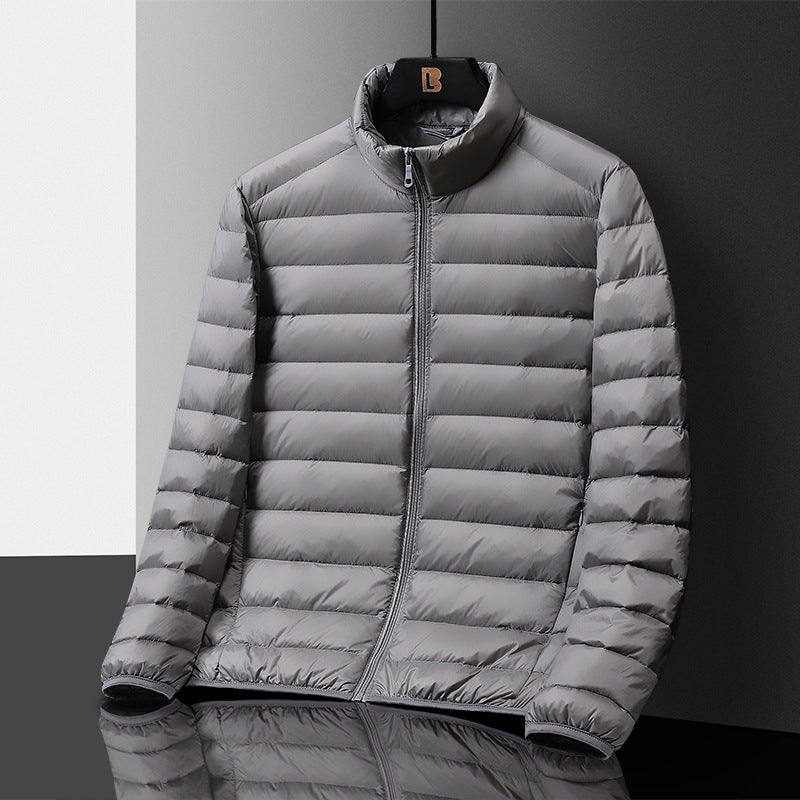 Herren Ultraleichte gesteppte Daunenimitat‑Steppjacke mit Stehkragen und Packfunktion Nord Taschen
