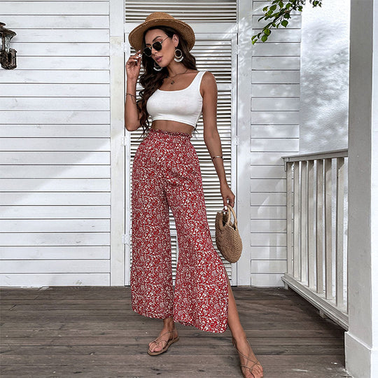 Damen Weite hochgeschnittene Palazzo‑Hose mit floralem Muster und seitlichem Beinschlitz Nord Taschen
