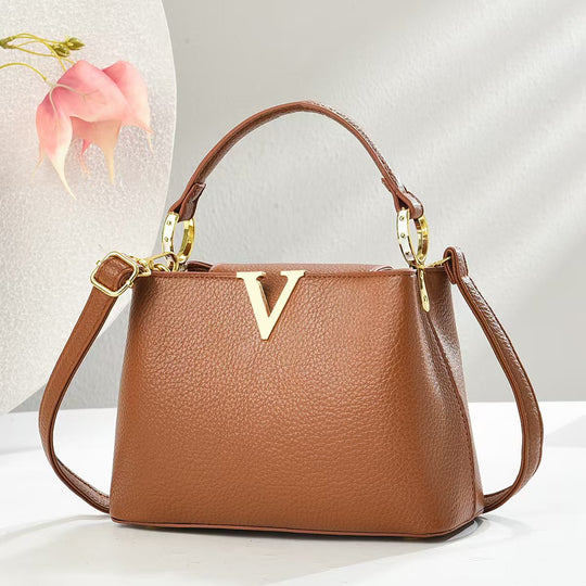 Damen stilvolle Handtasche mit goldenen Akzenten und verstellbarem Schulterriemen Nord Taschen