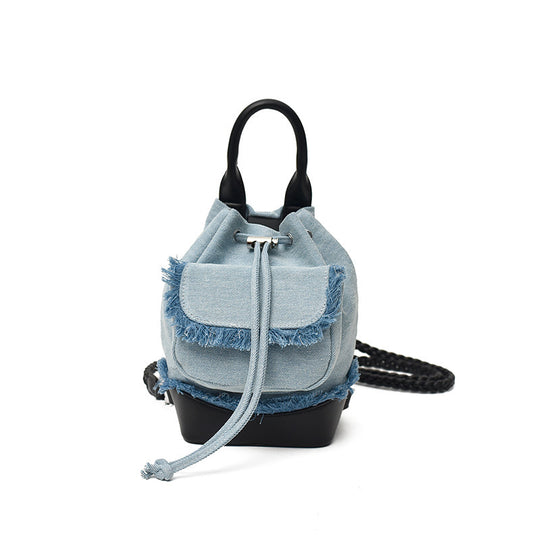Damen Denim Rucksack mit verspielten Fransen und praktischen Trageoptionen Nord Taschen