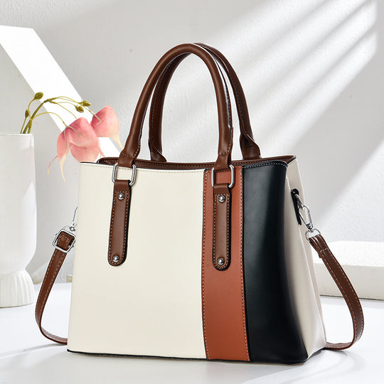 Damen Handtasche mit eleganten Farbakzenten und vielseitigem Tragegurt Nord Taschen