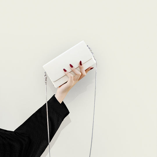 Damen Clutch-Tasche mit elegantem Kettenriemen und luxuriösem Leder Nord Taschen