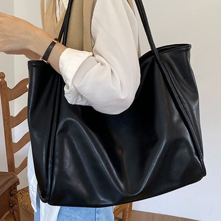 Damen Umhängetasche aus hochwertigem Kunstleder mit elegantem, geschwungenem Design Nord Taschen
