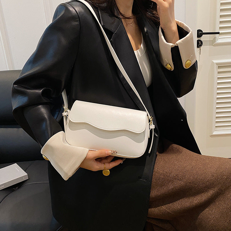 Damen Umhängetasche mit elegantem Wellenmuster Nord Taschen