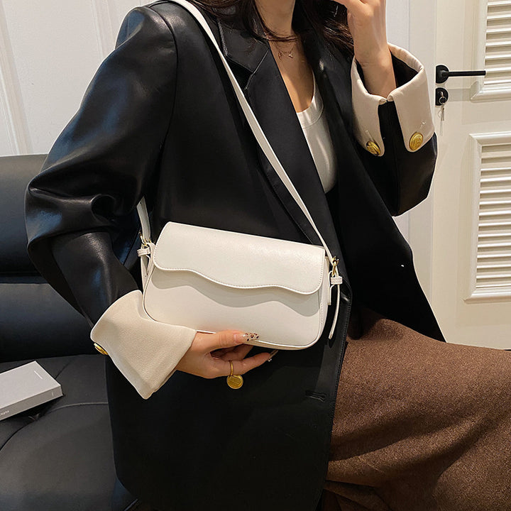 Damen Umhängetasche mit elegantem Wellenmuster Nord Taschen