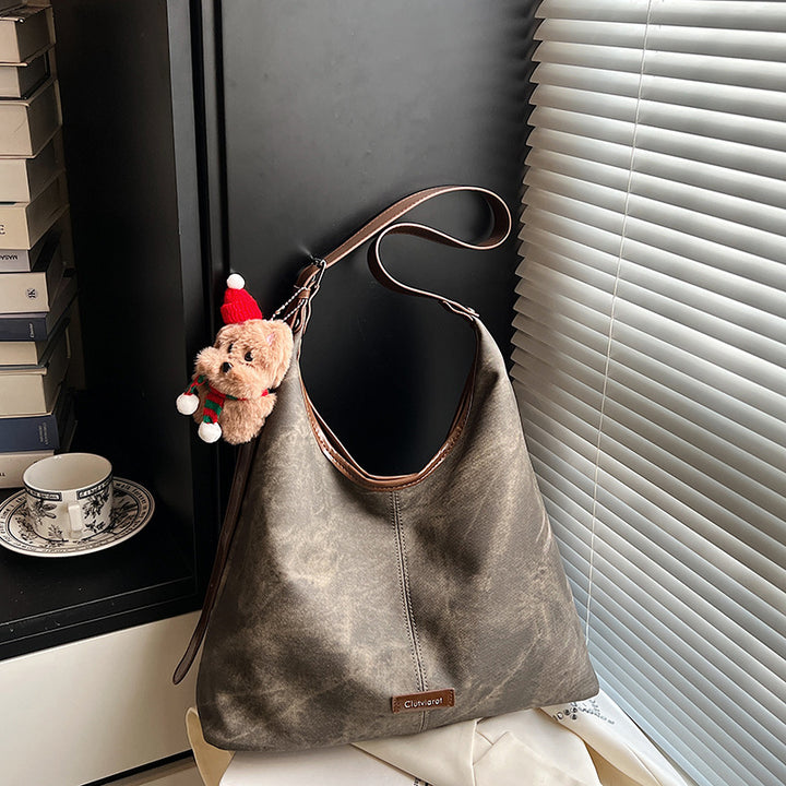 Damen Hobo-Tasche aus weichem, gewaschenem Material mit süßem Anhänger Nord Taschen