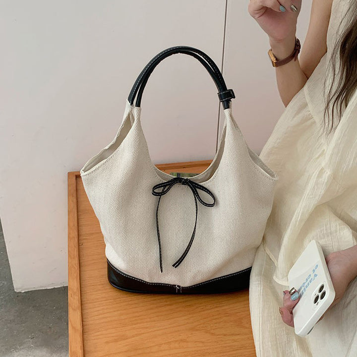 Damen Hobo-Tasche aus hochwertigem Material mit dekorativem Bindegürtel Nord Taschen