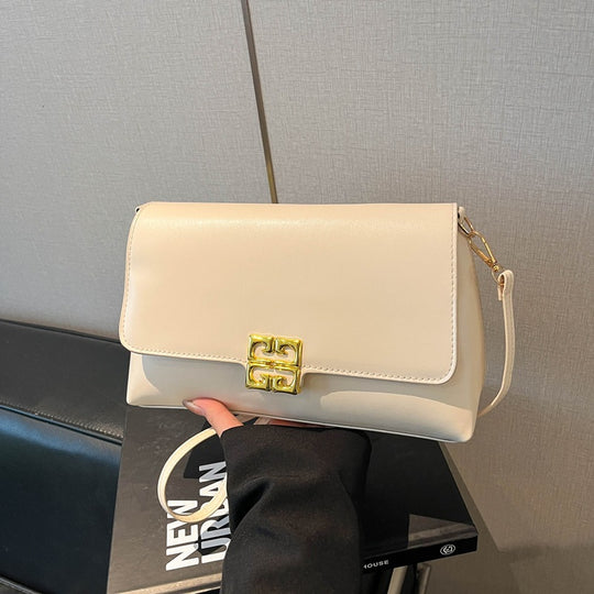 Damen Umhängetasche mit elegantem Klappverschluss und luxuriösen Details Nord Taschen