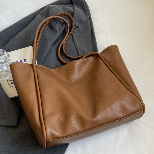 Damen elegante Schultertasche mit weichem Kunstleder und großzügigem Innenraum Nord Taschen