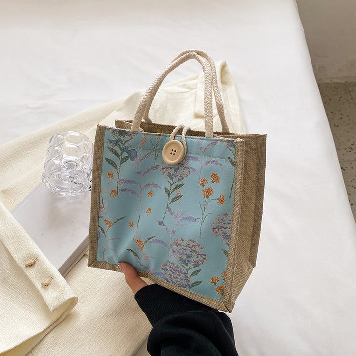 Damen Tragetasche mit floralem Dekor und robusten Materialien Nord Taschen