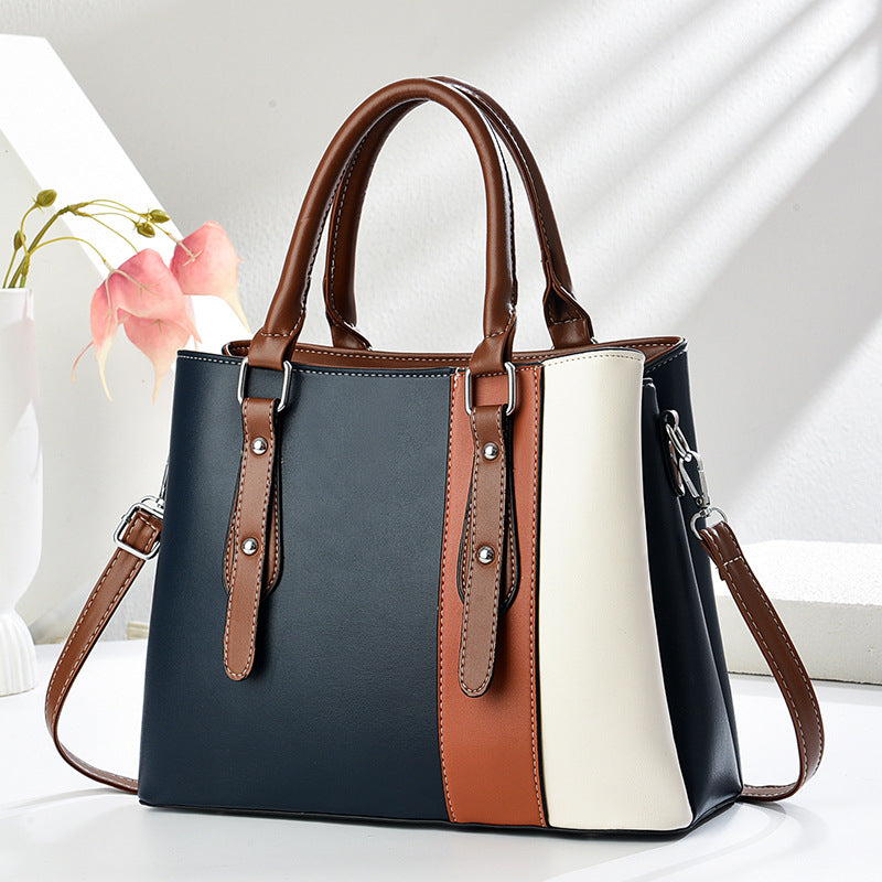 Damen Handtasche mit eleganten Farbakzenten und vielseitigem Tragegurt Nord Taschen