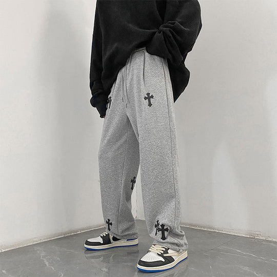 Herren weite Baumwoll-Jogginghose mit Allover-Kreuzprint und elastischem Tunnelzugbund Nord Taschen
