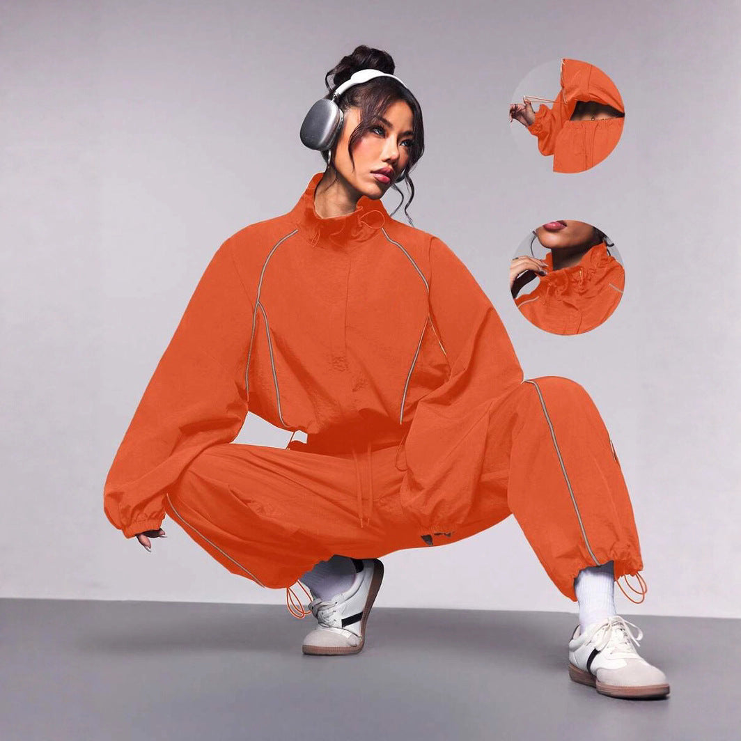 Damen sportives Cropped Windbreaker-Set mit Stehkragen Tunnelzug und reflektierenden Paspeln Nord Taschen