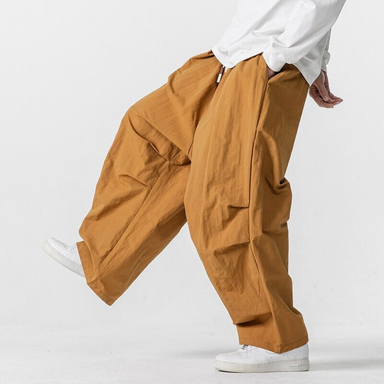 Herren Weite Utility-Loungehose mit überlappenden Falten und Kordelzugbund Nord Taschen