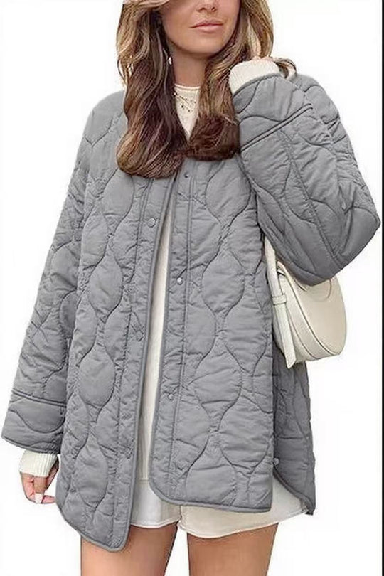Damen Steppjacke im Oversize Design mit gewölbter Steppung und seitlichem Schlitz Nord Taschen