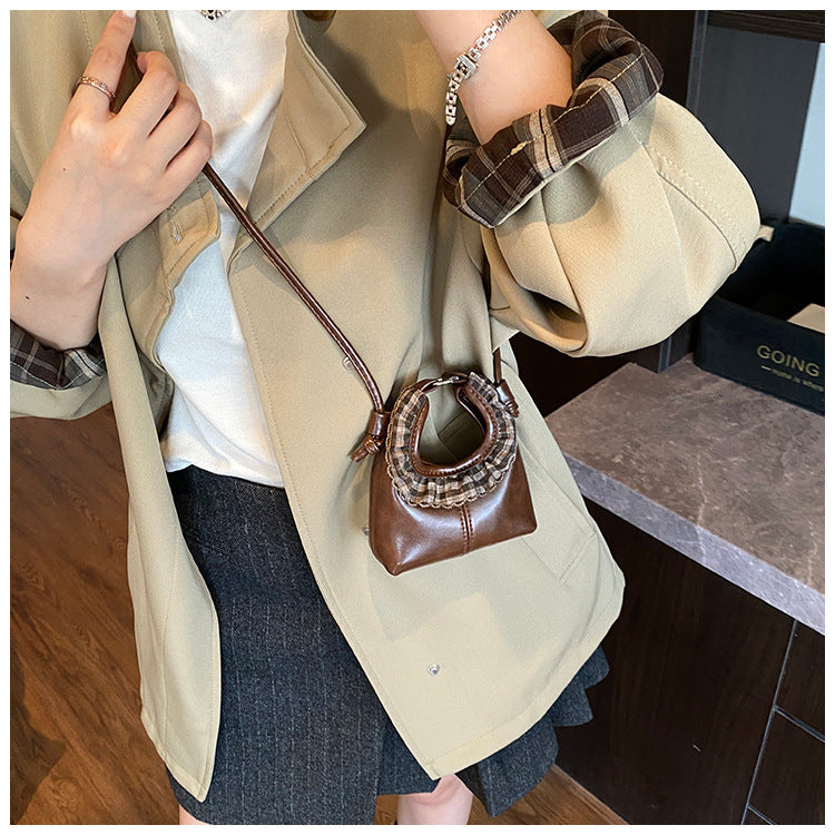 Damen Mini-Handtasche mit modischem Rüschendesign Nord Taschen